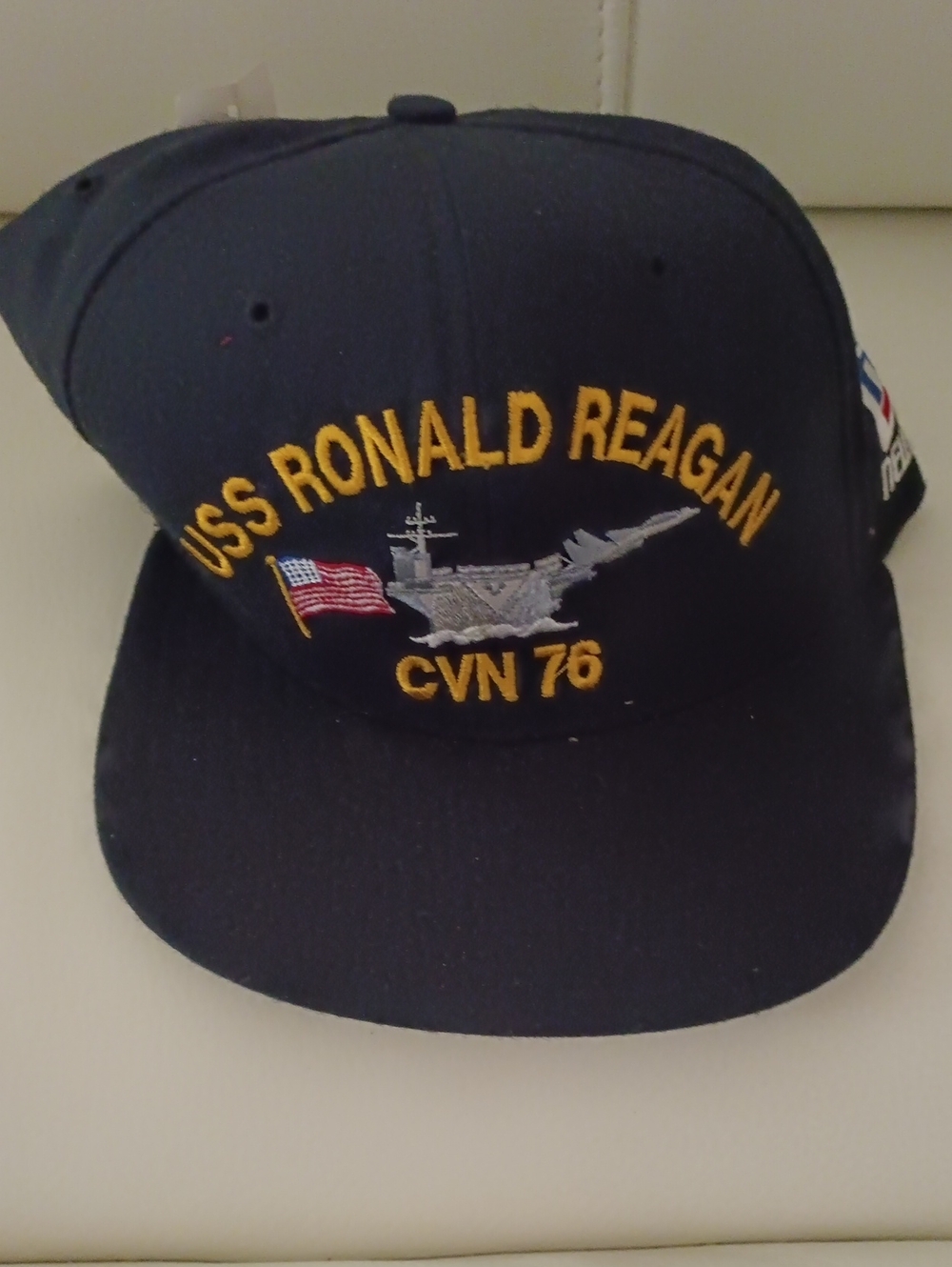New Era Navy Cap with Gold USS Ronald Reagan CVN 76 Embroidery